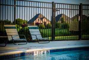 pool fencing ideas - steel pole fence